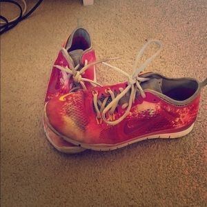 Pink Nike running shoes